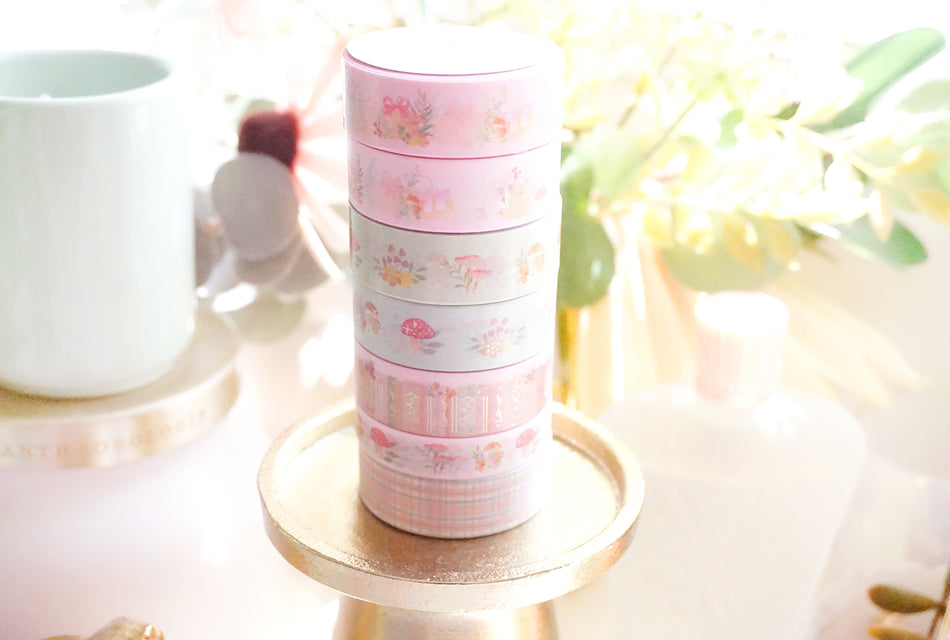 Stack of foil washi tape rolls showing consistent core and edge finish